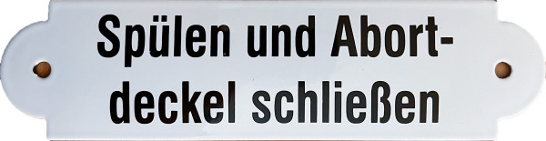 Emailleschild "Spülen und Abortdeckel..."